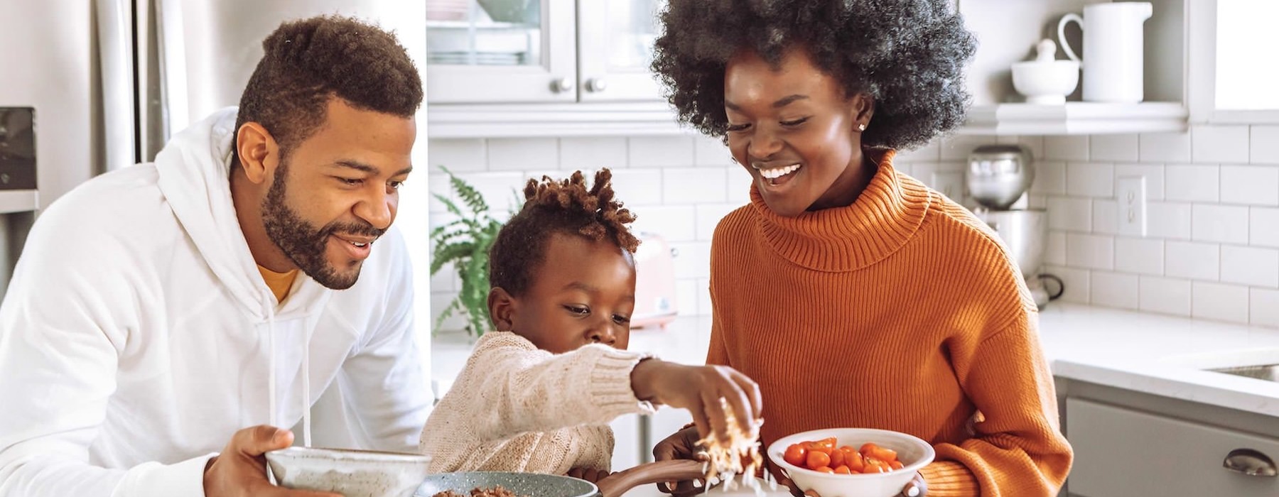 a family cooking together