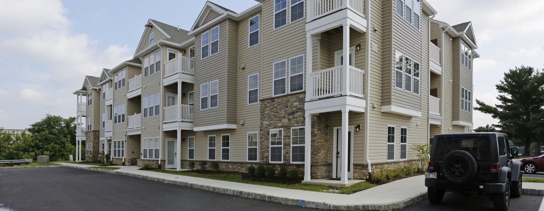 a large building with a parking lot